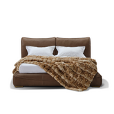 Modern NEFE leather bed upholstered in premium top-grain leather with clean lines in a luxury bedroom interior